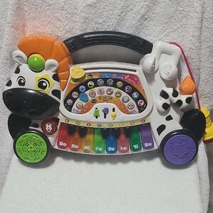 Orange and Green Learning Toy with Musical Features